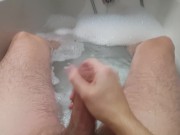 Stroking my hard cock in the bath and spurting cum
