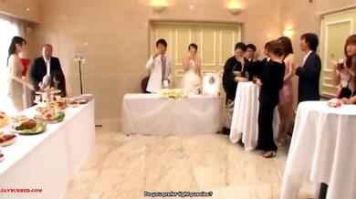 Slender Japanese brunette shares a passionate moment at the wedding reception