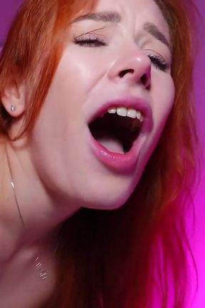 Neon-lit Homemade Video: Red-haired Hottie Takes in Huge Cock and Gets a Creampie