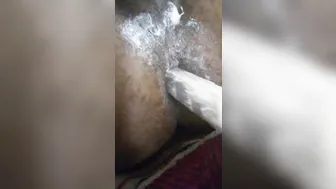 Young black guy stretches his ass with a big dildo