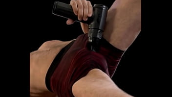 AIOnJon Stretching Reverie with Massage gun in Tight Shorts