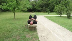 Park bench face sitting in my pink lace