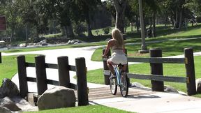 Colossal Backside Straddles Bicycle in Shorts Vol 2 Scene 1