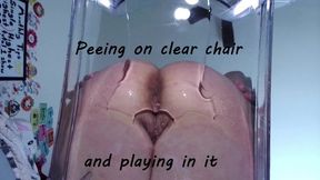 Peeing on clear chair