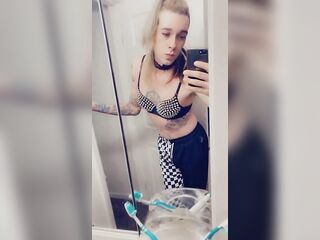 Trans Rocker Teasing Her Breasts