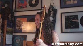 nikki montero playing the guitar with her balls, the photoshoot