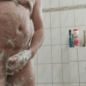 I like to wash myself in the shower, rub my cock balls and jerk off with a firm grip and anal fuck me