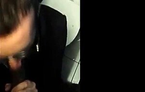 Bearded Guy Sucks Interracial Cock in a Public Restroom