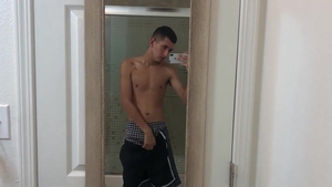 BarebackLatinoz: Roman wearing shorts stroking in bath