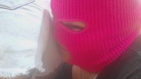 a masked woman smelling a stranger's fart