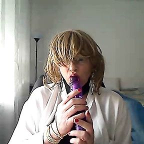 horny MILFhorny MILF tranny in front of webcam simulates a Blowjob while playing with a vibrator in her mouth