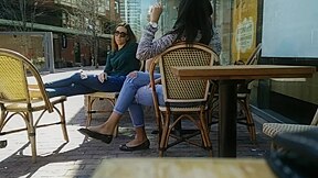 Two Delicious Brunettes Get Their Candid Feet Filmed At The Caffe