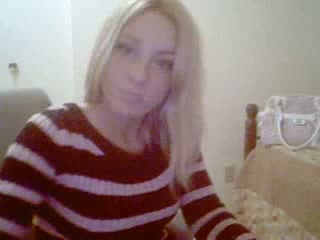 Hot blondie on the webcam showing off her new dress