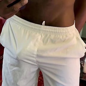 Bulging Around Commando in White Nylon Shorts