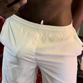 Bulging Around Commando in White Nylon Shorts