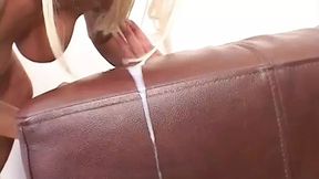 Blonde milf gets pounded on the sofa by a black dick