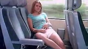 Naughty chick flashing her pechy tits in a train