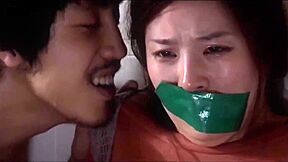 Two Korean Women Tape Gagged