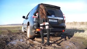 14_RGS Two beautiful girls get stuck on an expensive SUV in the mud