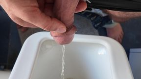 closeup pissing in urinal with big uncut dick