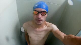 Watch this Latino guy stroke his big cock in a swimsuit while getting a hot load on his bathed body