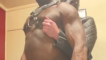 Black Bodybuilder Dominates White Leather Clad Sub in Nipple Play Scenes