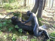 In a fantasy scene a frogman humps a dummy villain in the forest