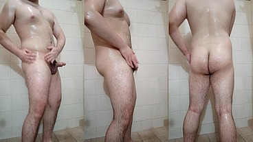 Muscular stud showers after his workout