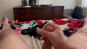 Cumshot while on a bed of Lingerie