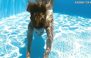 Russian baddy Ivi Rein gets horny underwater