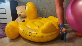 mastrubation girl poping inflatavle duck with heels