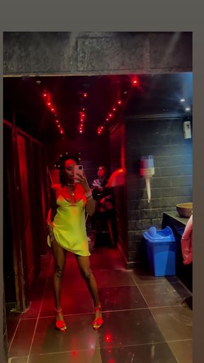 Woman in yellow dress dancing