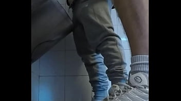 Amateur boys in sneakers wank and try handjob in public toilets&#039_ urinal