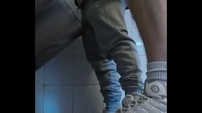 Amateur boys in sneakers wank and try handjob in public toilets'_ urinal
