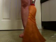 Hairy brunette Beryl Aspen strips while she cleans to show off her huge ass