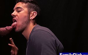 Horny teen sucks stepdads big cock through a glory hole