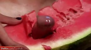 T-girl strokes and pounds her big shecock in a watermelon