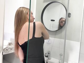 Amazingly gorgeous college gal in the washroom with a super petticoat miniskirt shows her booty