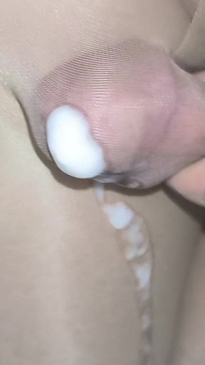 Very Juicy Cumshot Through the Shiny Nude Pantyhose Close