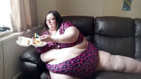 SSBBW stuffing her face in bikini