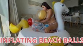 Inflating beach balls
