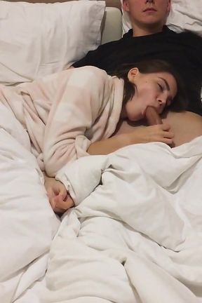 Hottie Gives a Relaxing Home Blowjob While Watching a Movie