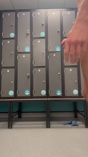 Athletic jock wanks in locker room