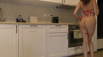 Sexy and hot long legs beauty in the kitchen takes off her underwear in a transparent lingerie with seethrough panties