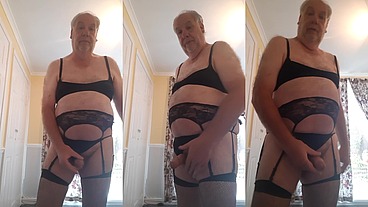Black fishnet suspenders and bra on