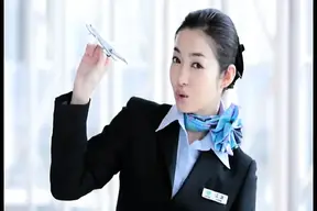 Flight attendant Ryu delivers an elegant and horny performance on a