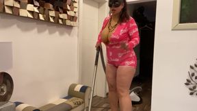 Vacuuming with 38F fake tits