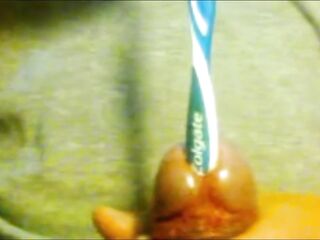 Urethral insertion with toothbrush