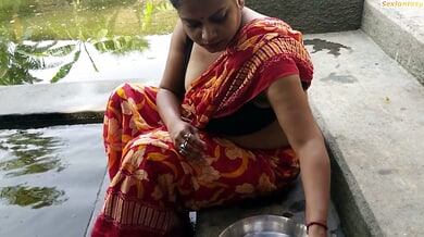 Dark-haired woman in floral sari shares passionate bedroom moment with her lover