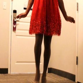 A 1950&#039;s SISSY DANCE FOR HER HUSBAND WEARING A PARTY DRESS